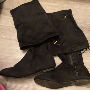 Over the knee suede boots. Zip half way up. String tie closure for snug fit